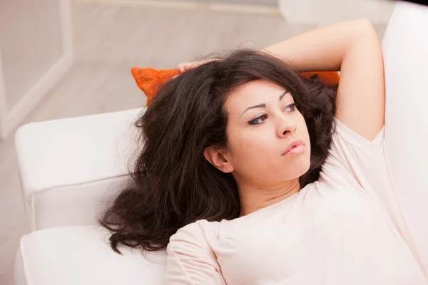 Young woman relaxing and thinking — Stock Photo, Image