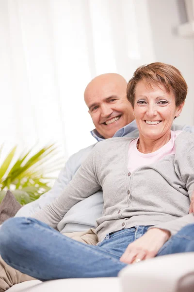 Mature couple loving each other at home — Stock Photo, Image