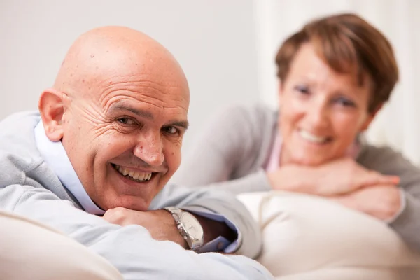 Mature couple loving each other at home — Stock Photo, Image