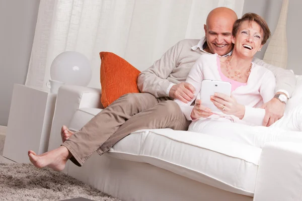 Mature couple loving each other at home — Stock Photo, Image