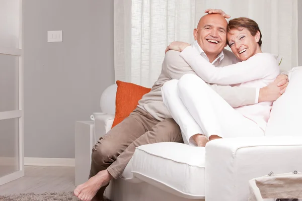 Mature couple loving each other at home — Stock Photo, Image