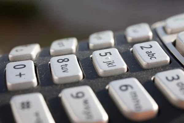 Primer plano de un teclado numérico a la luz solar directa —  Fotos de Stock