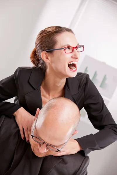 Business woman driven insane hitting a man — Stock Photo, Image