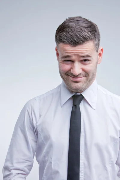 Doubtful man laughing at you — Stock Photo, Image