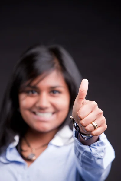 Thumbs up by a successful indian girl — Stock Photo, Image