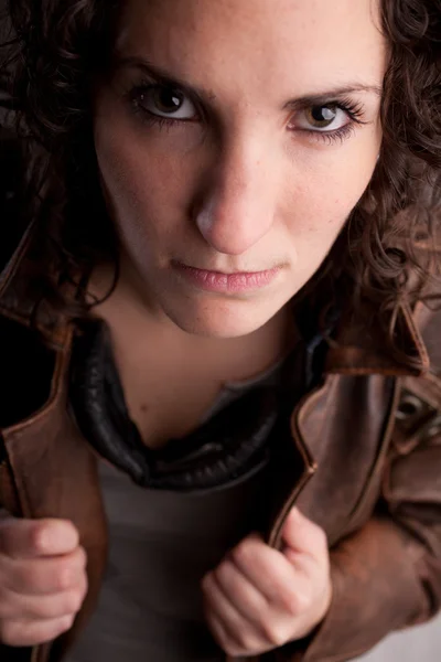 Foreground portrait of a serious woman — Stock Photo, Image