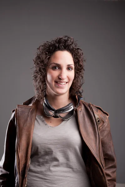 Smiling motorbiker woman in leather jacket — Stock Photo, Image