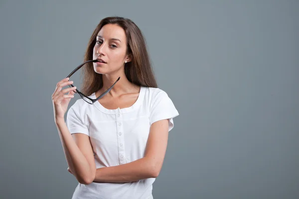 Attracting girl with a sidepiece in her mouth — Stock Photo, Image