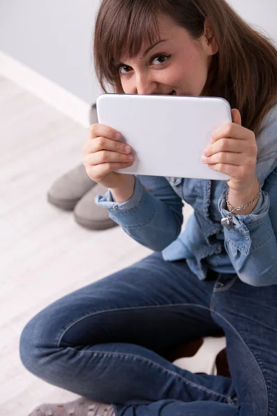 Smiling woman with a digital tablet — Stock Photo, Image