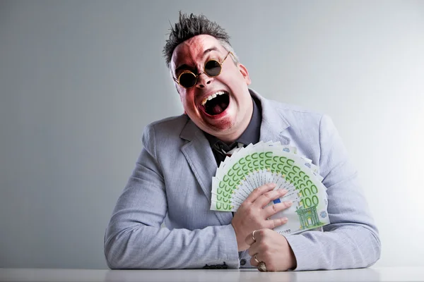 Business man met geld — Stockfoto