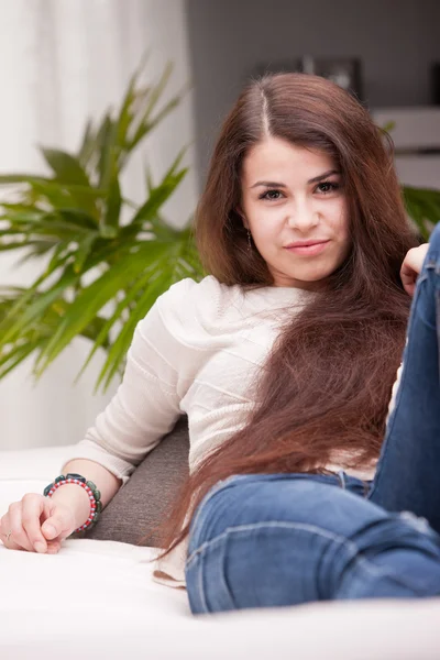Intense look of a young girl relaxed — Stock Photo, Image
