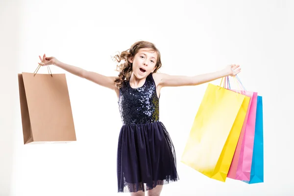 Boldog lány bevásárló táskák — Stock Fotó