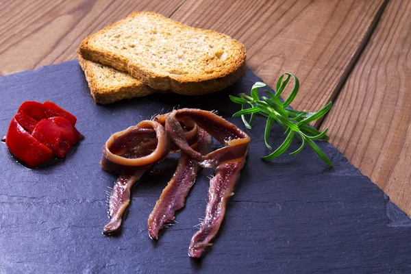 Anchovas com pauzinhos a bordo — Fotografia de Stock