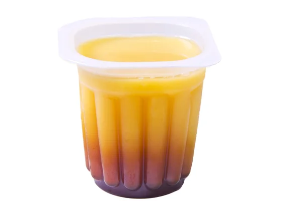 Karamel ve vanilyalı muhallebi ile konteyner — Stok fotoğraf