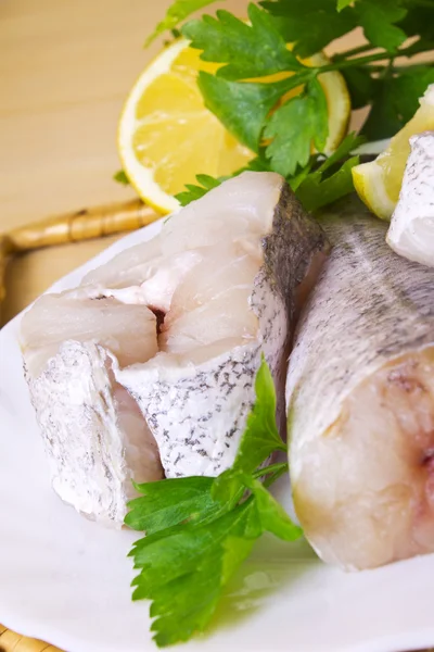 Fresh hake on wooden background — Stock Photo, Image