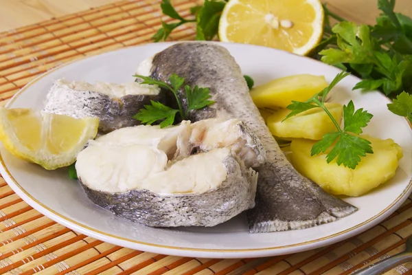 Fresh hake on wooden background — Stock Photo, Image