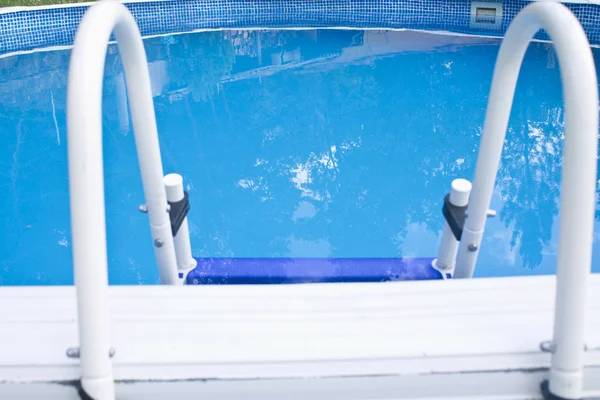 Swimming pool with blue water — Stock Photo, Image