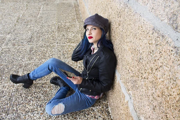 Young woman with the tablet on the street Royalty Free Stock Photos