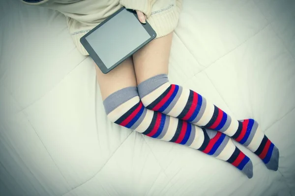 Woman Long Socks Lying Using Tablet Book — Stock Photo, Image