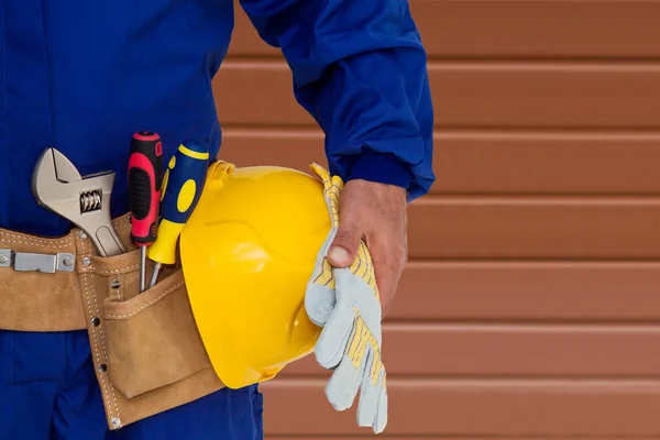 builder with tool belt, renovations, repairs and DIY