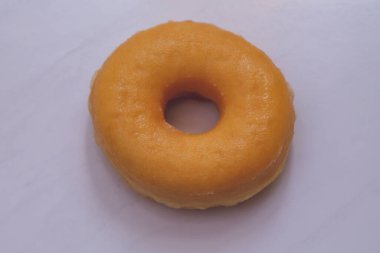 top view of a doughnut with white background