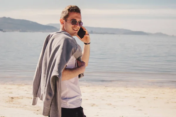 Man Sunglasses Walking Beach Talking Phone — Foto de Stock