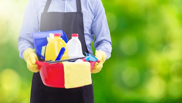 Man Bucket Cleaning Products Green Background — Stock Photo, Image