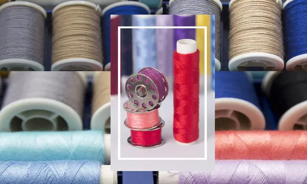 Композиция красочных нитей для шитья — стоковое фото