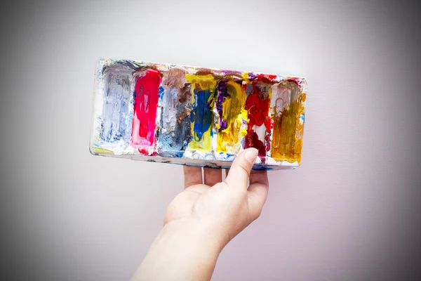 Hand with brushes — Stock Photo, Image