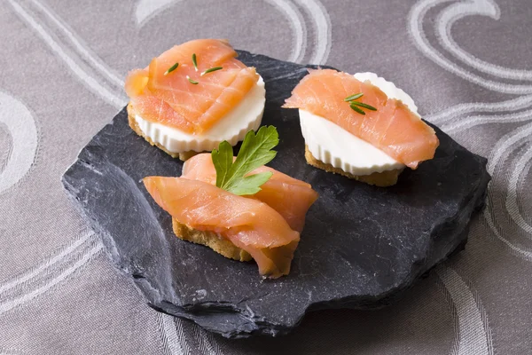 Delicious salmon canapes — Stock Photo, Image