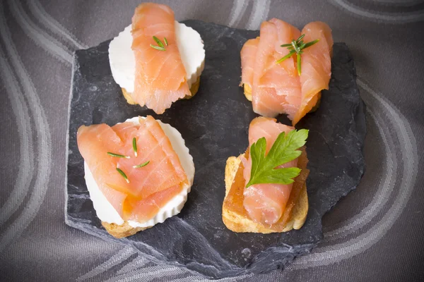 Salmon canapes — Stock Photo, Image