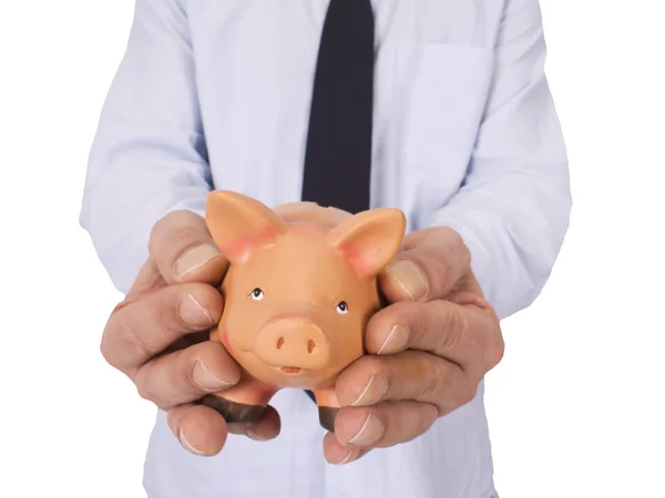 Biznesmen z piggy bank w ręce — Zdjęcie stockowe