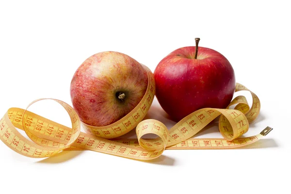 Fruit met een meetlint geïsoleerd — Stockfoto