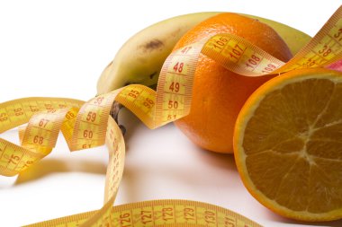 Meyve ve arka plan ile şerit metre