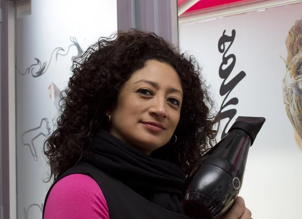 Hairdresser with hair dryer — Stock Photo, Image