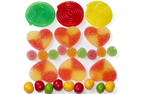 Assortment of candies and jelly beans isolated — Stock Photo, Image