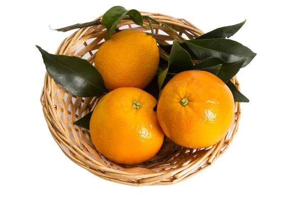 Basket of oranges isolated — Stock Photo, Image