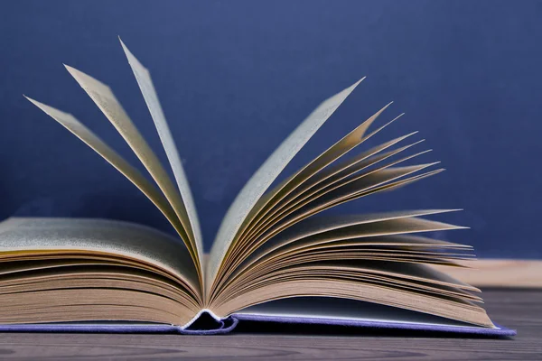 Blackboard and books — Stock Photo, Image