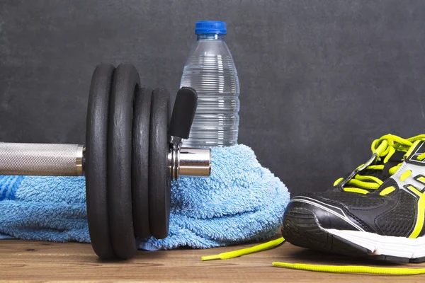 Dumbbell and water — Stock Photo, Image