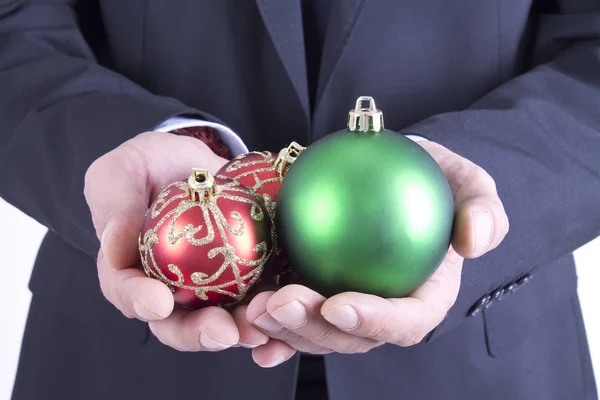 Zakenman met Kerst ornamenten — Stockfoto