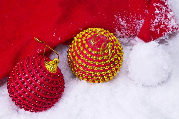 Christmas ornaments in the snow — Stock Photo, Image