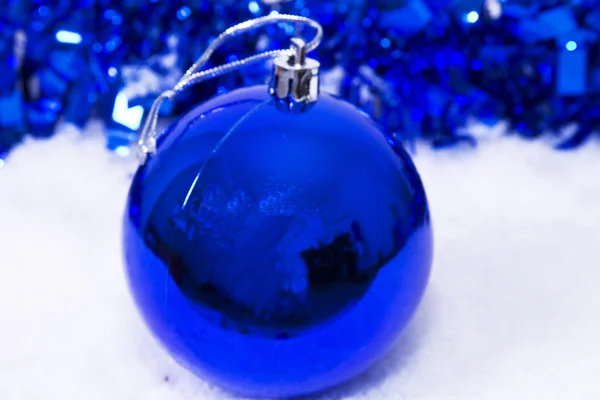 Christmas balls in the snow isolated — Stock Photo, Image