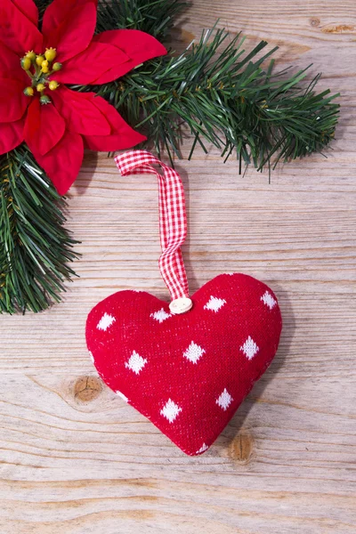 Christmas hearts on wooden background Royalty Free Stock Images