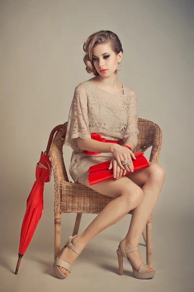 The girl in a grey dress with red accessories 1232. — Stock Photo, Image