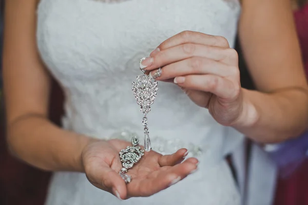 Earrings in hands 1848. — Stock Photo, Image