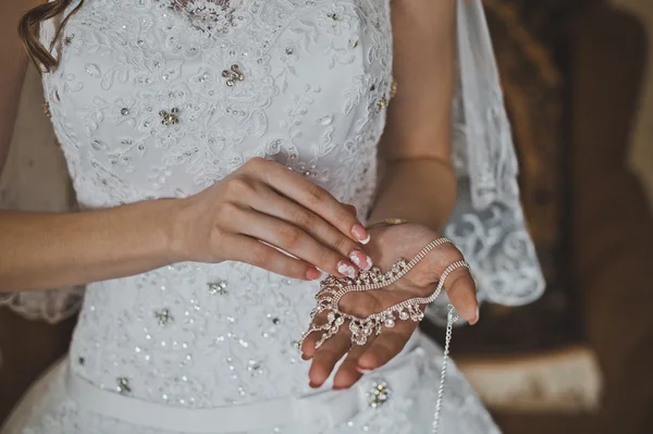 Costume jewellery in hands of the girl 2353. — Stock Photo, Image