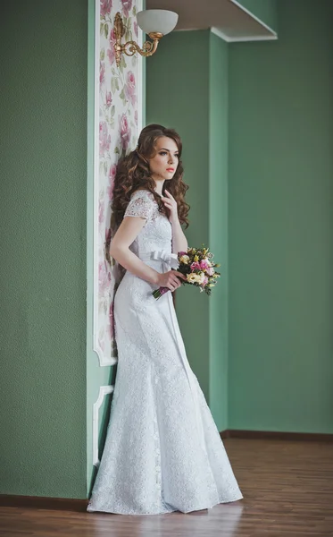 The girl has leant against a wall 2650. — Stock Photo, Image