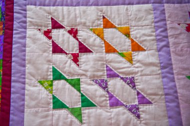 Blanket from pieces of a fabric with the image of stars 2986.