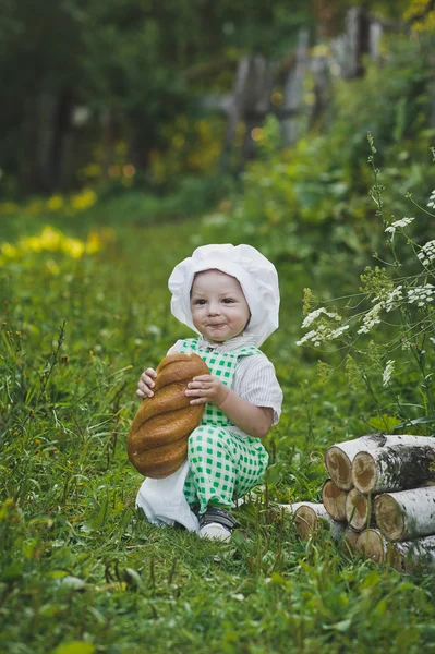 Een kleine jongen houden een stokje 4694. — Stockfoto