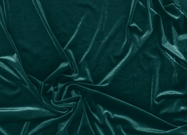 Draped sammet tyg i trendig grön färg. Abstrakt modern bakgrund — Stockfoto